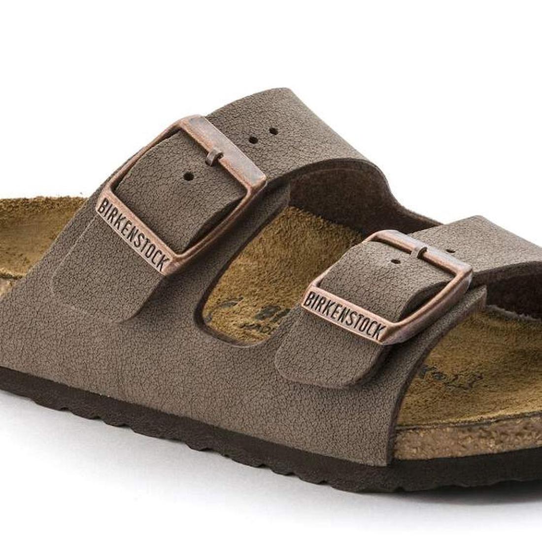 A close-up of Birkenstock Kids Arizona Mocca Birkibuc Narrow Slides, featuring two adjustable straps with metal buckles and a signature cork footbed., 48050, 48051, 48052, 4052001281663, 4052001281670, 4052001281687, 4052001281694, 4052001281700, 48058
