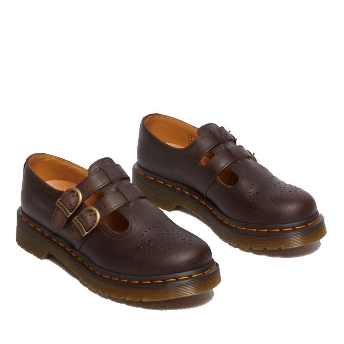 The Dr Martens 8065 2 Strap Mary Jane Shoe in Crazy Horse Brown features dual buckles, perforated toe detailing, thick ridged soles, and iconic yellow stitching., 190665588941, 190665588958, 190665588965, 190665588972, 13164654654, 190665588996, 190665589
