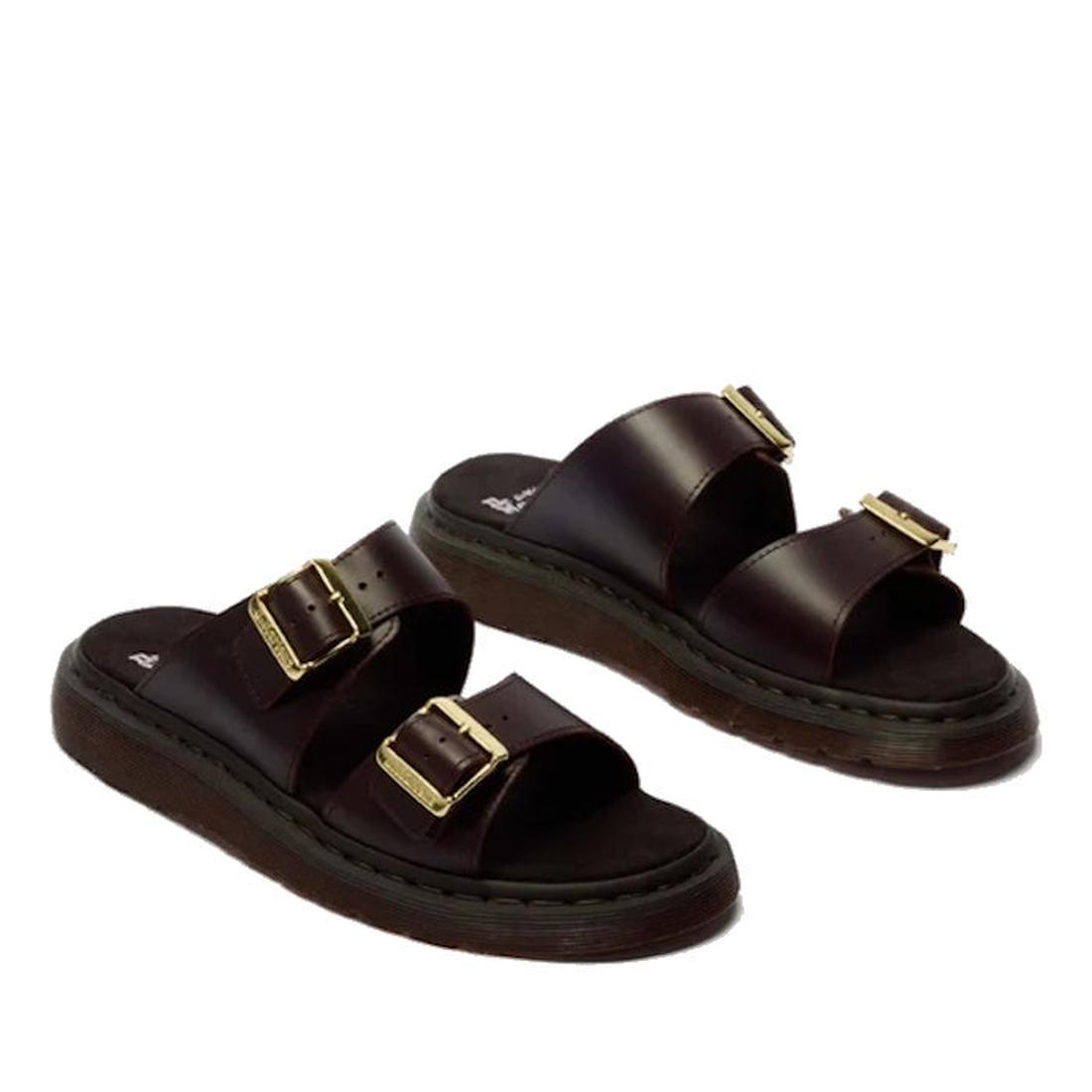 The Dr Martens Josef Charro Atlas Slide Sandal Leather features dark brown Atlas leather, two adjustable gold buckles per shoe, and thick textured brown soles., 52357, 190665783841, 190665783858, 190665783872, 190665783889, 190665783896, 52363, 52364