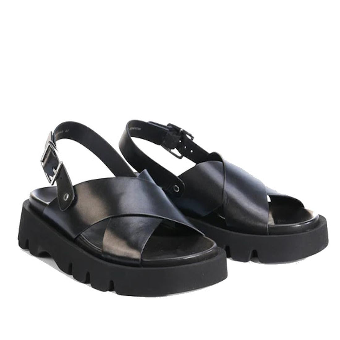 The EOS Monnis Black Women's Leather Sandal features a black anatomical footbed, chunky sole, wide leather crossover straps, and adjustable ankle straps with metal buckles for comfort and support., 48698, 48699, 9321191312279, 9321191312286, 9321191312293