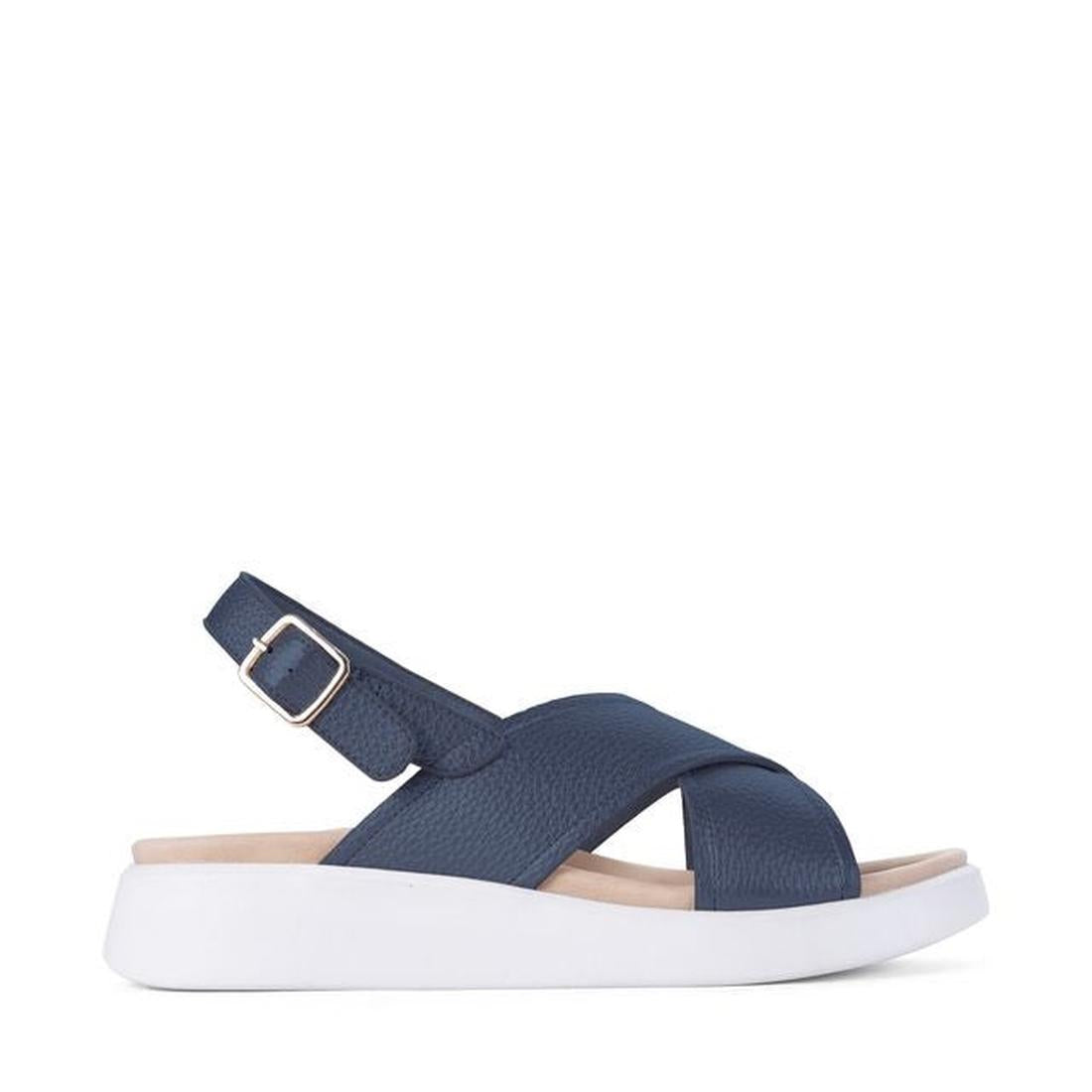 Los Cabos Bogota Navy Women’s Sandal, with soft navy straps, adjustable buckle, and comfy white sole, shown from the side. ksnz