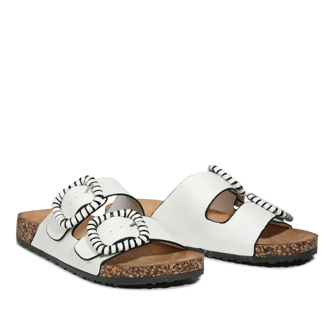 Introducing the Los Cabos Jirona White Women’s Double Strap Slides—featuring a pair of white slides with double straps, large striped buckles, anatomically shaped footbeds for comfort, cork soles, and black rubber bottoms., 9321191308135, 9321191308142, 9