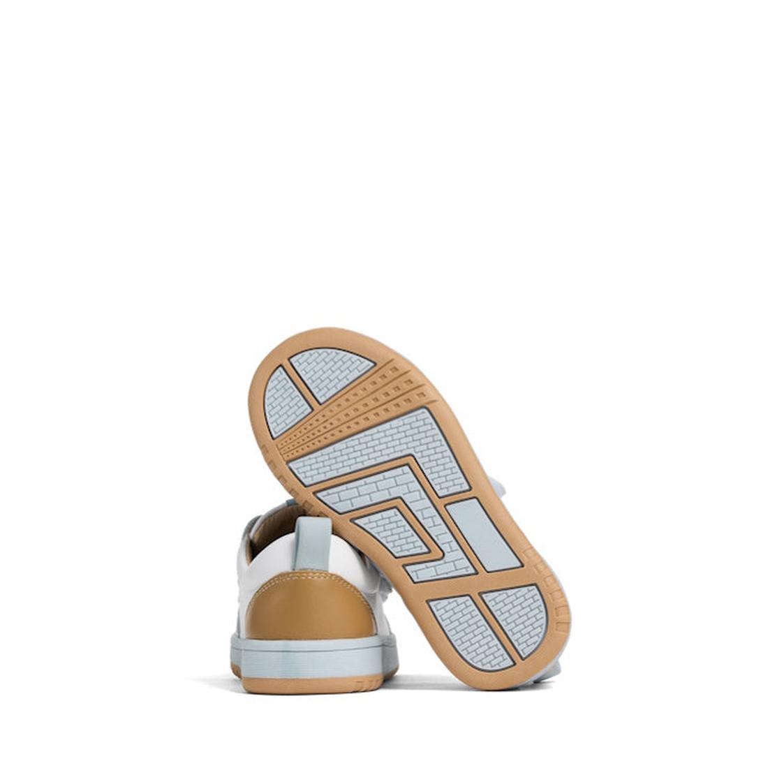 The Pretty Brave Happy Trainer White/Blue Sneaker for kids features leather in white and blue, with triple velcro straps and a patterned sole. One shoe stands upright, the other leans to show the sole against a plain white background., 40204, 942007533580