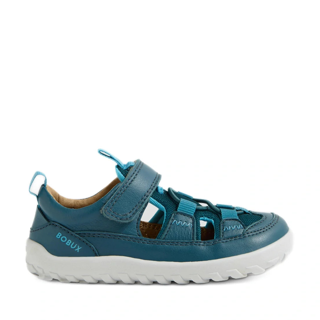 A green kids’ leather sandal with a white sole, side openings, a closed toe, and a Velcro strap. The brand Bobux is printed on the side of the shoe. Product name: Bobux IW Iwalk Rocky Mediterranean Green Closed Toe Sandal Barefoot., 9420074863614, 9420074