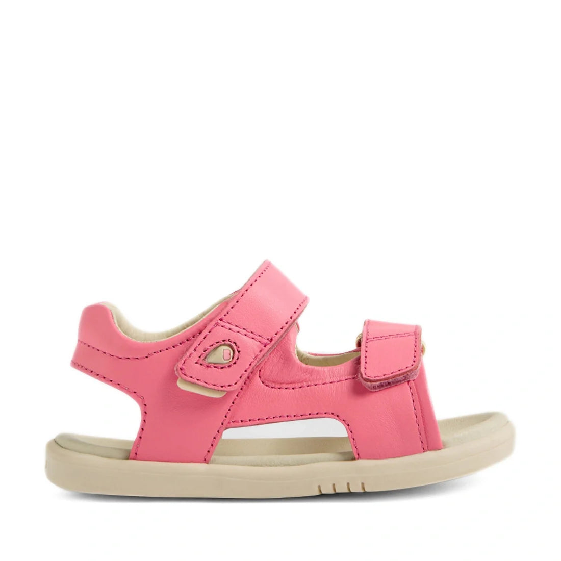The Bobux IWalk Strand Sandal in Pink Lemonade is an open-toe toddler sandal, crafted from premium materials for lasting durability. Featuring two adjustable velcro straps for a secure fit and a comfortable beige sole, these stylish leather sandals are pr
