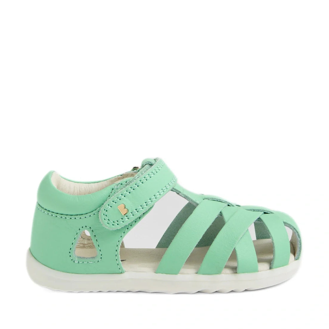 A Bobux Step Up SU Tropicana II Mint Jelly Green Closed Toe Sandal for toddlers, featuring a closed heel, open toe, and white sole. This sandal comes with a hook-and-loop strap and multiple crisscross straps over the foot, providing the comfort and suppor