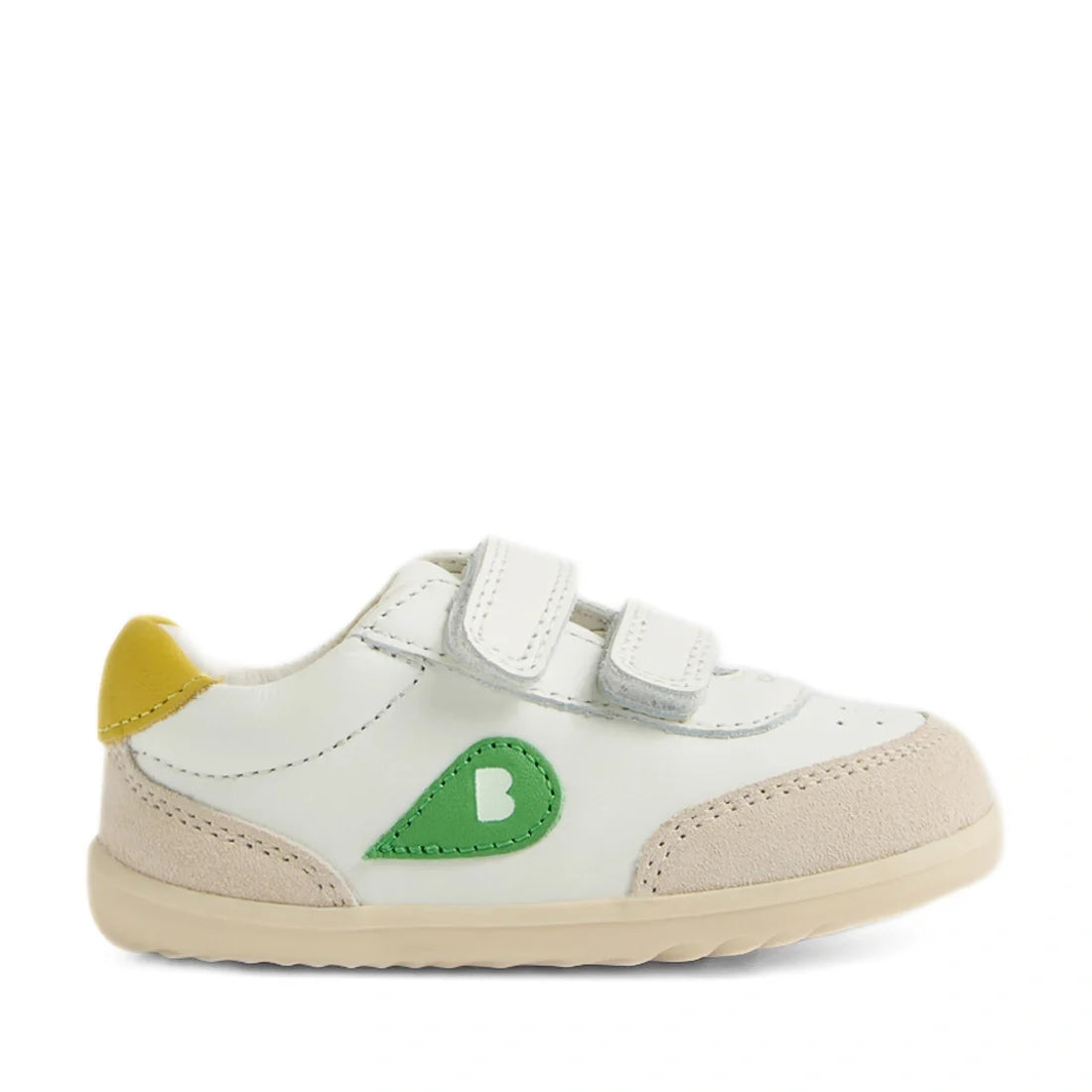 The Bobux Step Up SU Champ Sneaker First Walker in White Green is a toddler shoe featuring beige suede accents, green and yellow details, and two hook and loop straps. Perfect for first walkers, it has a small green design with a white heart on the side.,