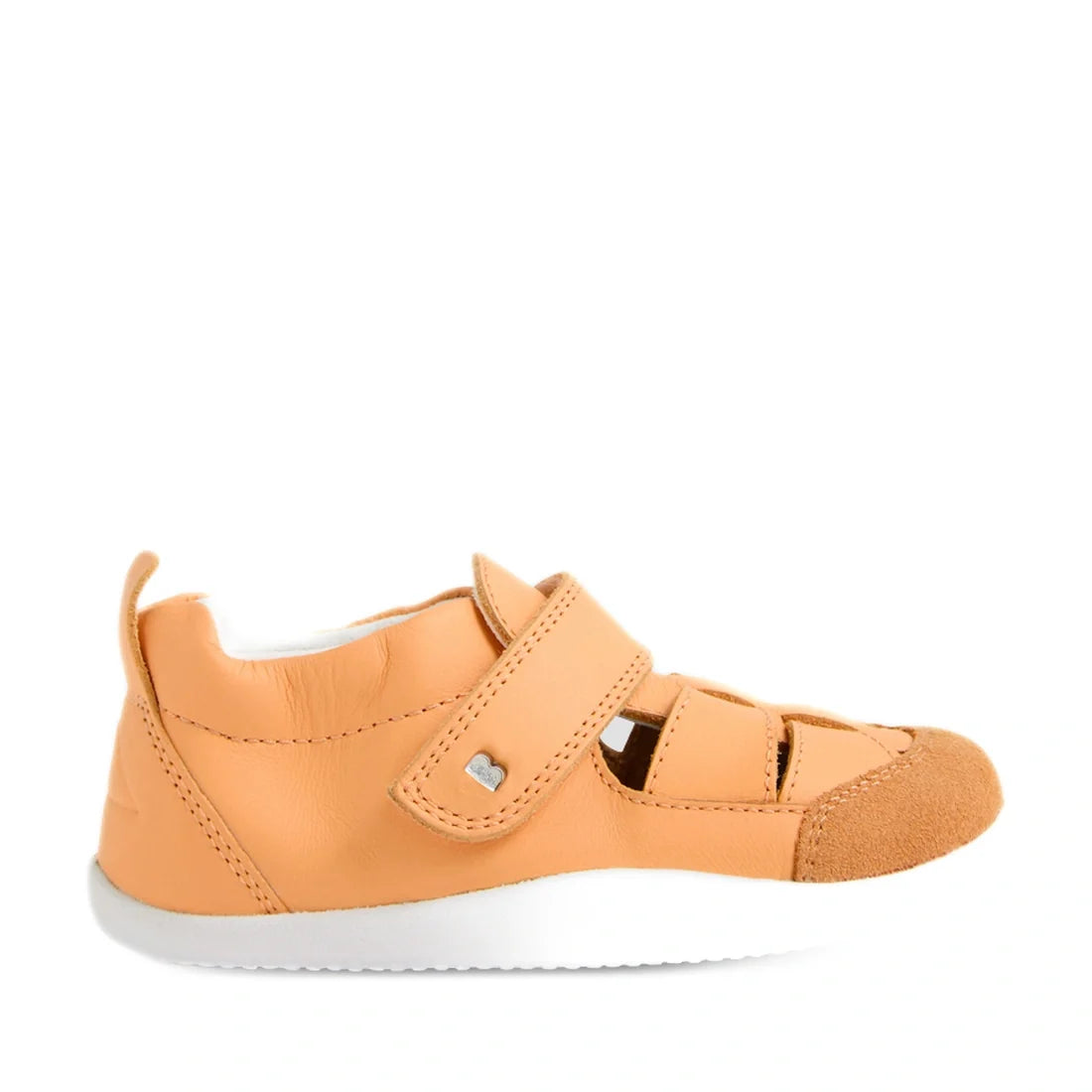 Introducing the Bobux XP Explorer Maris First Walker Sandal in Peach Jelly—a peach-toned leather baby shoe inspired by classic fisherman sandals. It features charming cutout details, a secure velcro strap, suede toe cap, and a flexible white rubber sole—m