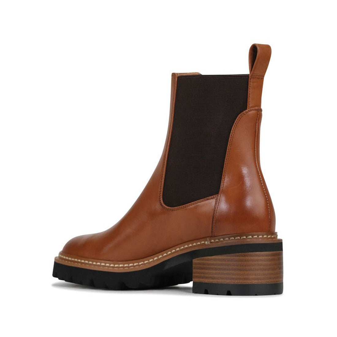 29612,
29613,
29614,
29615,
29616,
29617,
EOS Linear women’s boot in Brandy leather with side gussets, block heel, and lugged sole. Side View of Right Foot taken from the heel showing heel detailing on the inside of the leg, 29612, 29613, 29614, 29615, 2