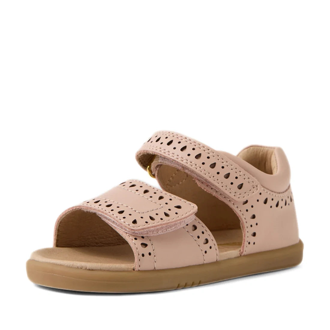 The Bobux IWalk Logan Toddlers Sandal in Cameo Rose Pink is an open-toe sandal for toddler girls, featuring decorative cut-out patterns, adjustable Velcro straps, and a flat light brown rubber sole., 9420074853172, 9420074853189, 9420074853196, 9420074853