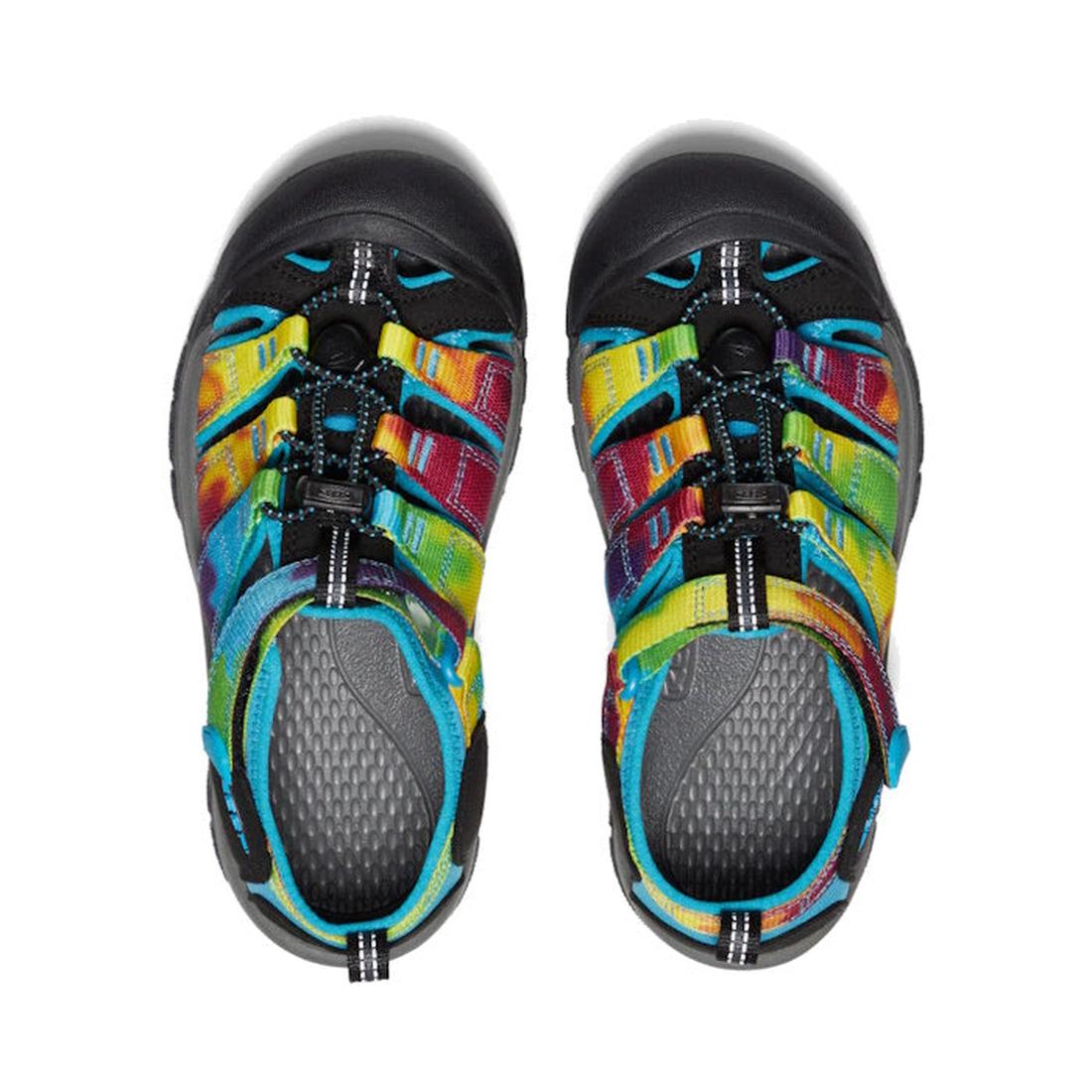Top view of the Keen Kids Newport H2 Youths Sandals in Rainbow Tie Dye, featuring black closed rubber toes, a vibrant multicolored woven design, and an elastic bungee lace system. Inspired by the water-friendly original, these sandals are perfect for acti