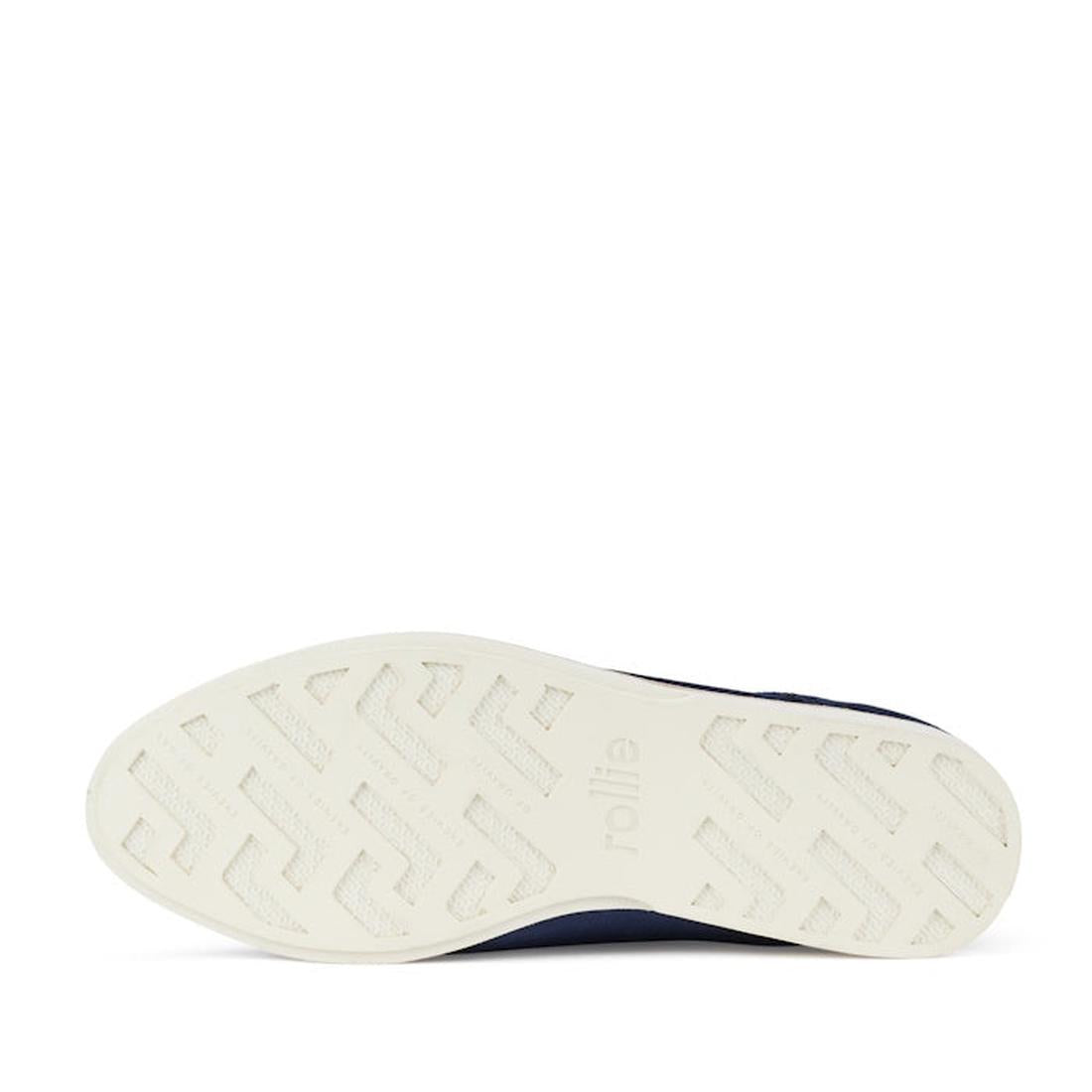 The image displays the white textured sole with a geometric pattern, "rollie" embossed, and code SC02100, from the Rollie Womens Derby Navy Velvet Brogue Shoe., 9339554000046, 9339554035741, 9339554028743, 9339554006123, 9339554009810