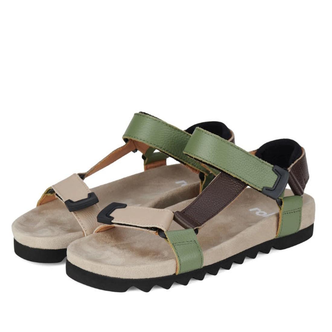 The Rollie Womens Sandal Tooth Wedge Trail Green Brown features open toes, beige, green, and brown adjustable leather straps with black plastic buckles, tan cushioned footbeds, and black textured EVA outsoles. Sandals are shown side by side facing left.,