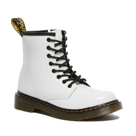 Dr Martens Kids 1460 J Junior Lace Up Boot in shiny white, with sturdy zip closure, comfy sole, and classic yellow stitching.  ksnz