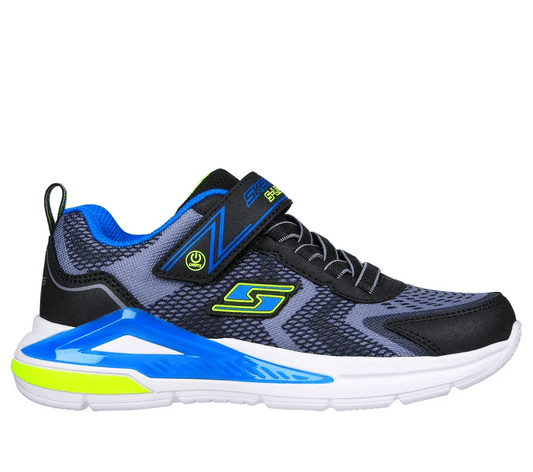 Skechers Youths S Light Tri-Namics sneaker in black and blue, with neon green details, elastic laces, strap closure, and a white sole.  ksnz