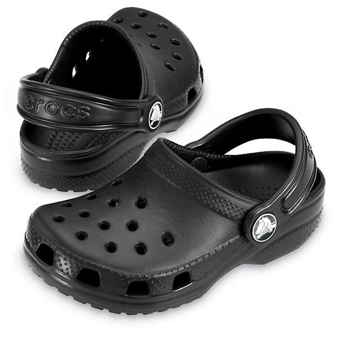 The Crocs Kids - Youths Classic Clog K Black Sandal features ventilation holes, adjustable heel straps, and a water-friendly design—ideal for comfort and everyday wear. Displayed on a white background.