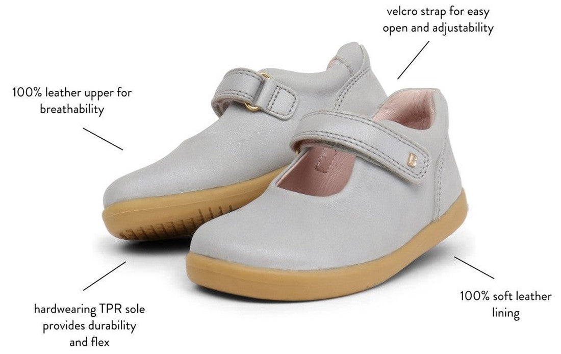 Bobux Iwalk Delight Mary Jane Navy 628026A: Navy children’s shoes with leather upper, soft pink leather lining, adjustable velcro strap, and durable flexible tan TPR soles. Labels highlight comfort and flexibility features., 9420062056028, 9420062056035, 