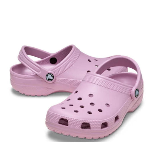 A pair of Crocs - Classic Clog Hydrangea Pink Purple Adults with ventilation holes and adjustable heel straps, shown on a white background.