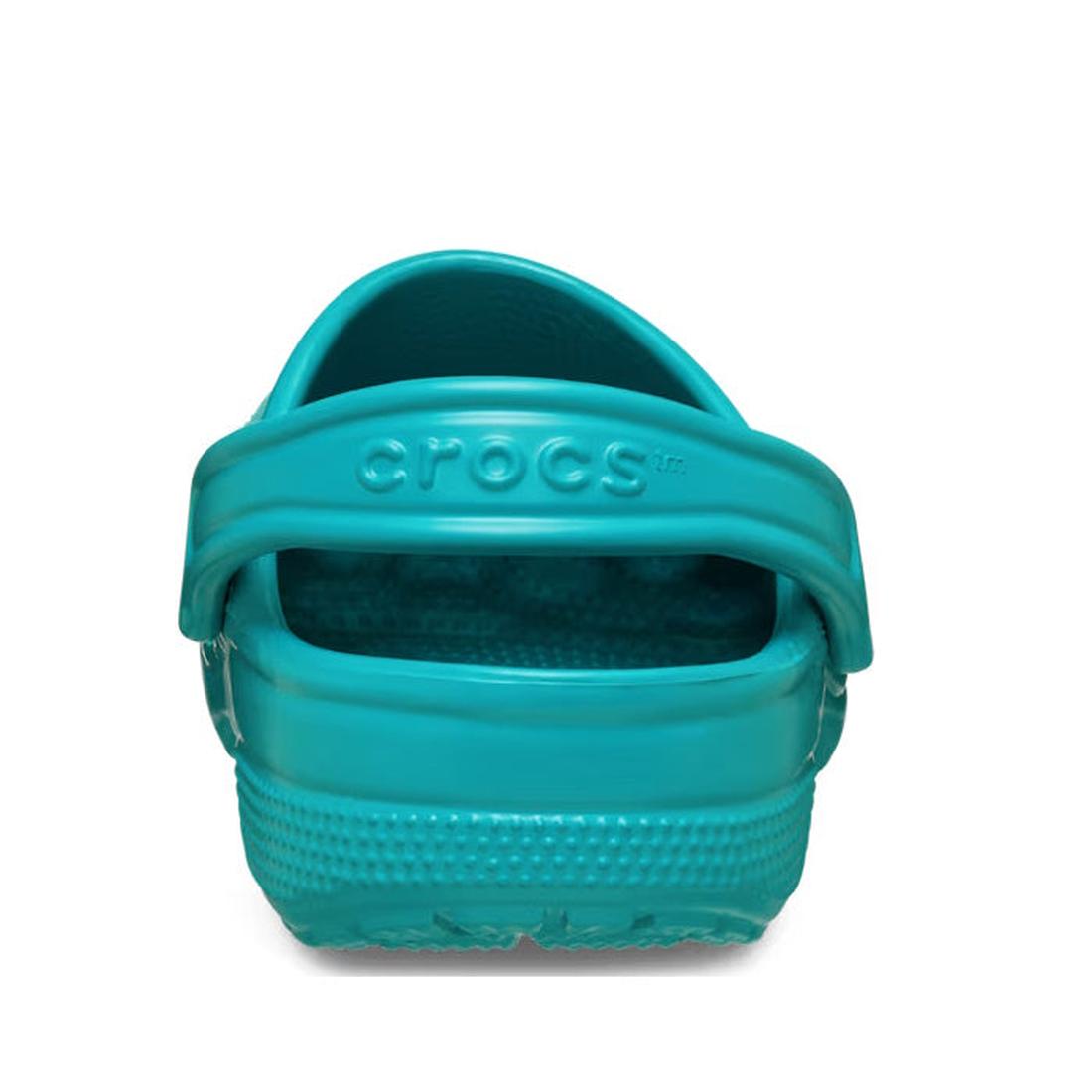 A Turbo Teal Crocs - Classic Clog for adults, shown from the back with a heel strap, textured sole, unisex design, and “crocs” embossed above the strap., 198445268182, 198445268199, 198445268205, 198445268212, 198445268229, 198445268236, 198445268120, 198