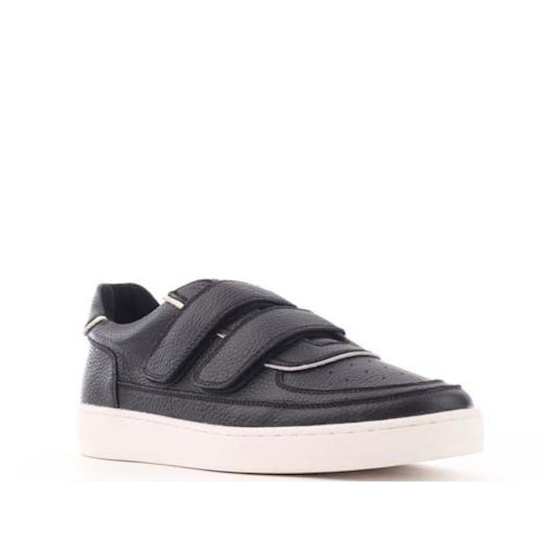 Alfie & Evie Apple Black Leather Women’s Sneaker with comfy white sole and easy hook-and-loop straps, angled on a plain backdrop.  ksnz