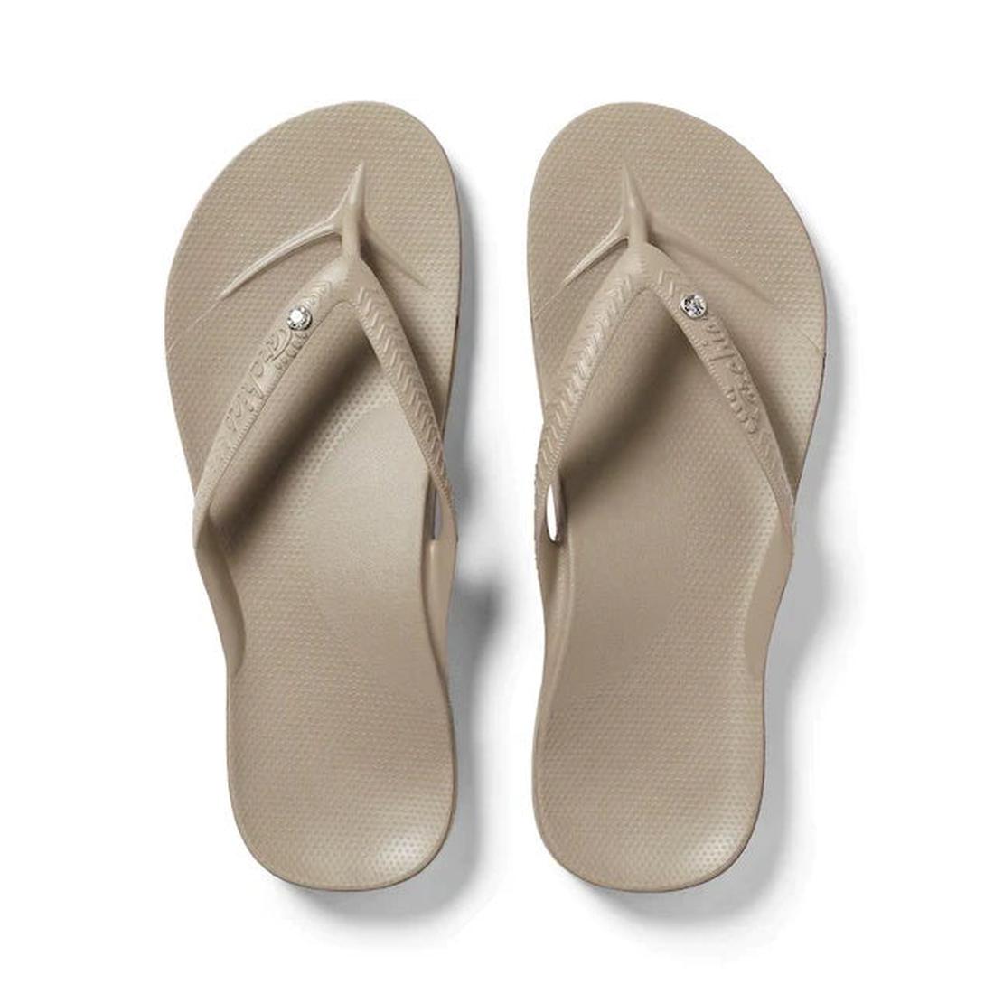 The Archies Footwear Arch Support Jandal in Taupe Crystal offers cozy arch support, grippy soles, and sparkly straps kids will love.  ksnz
