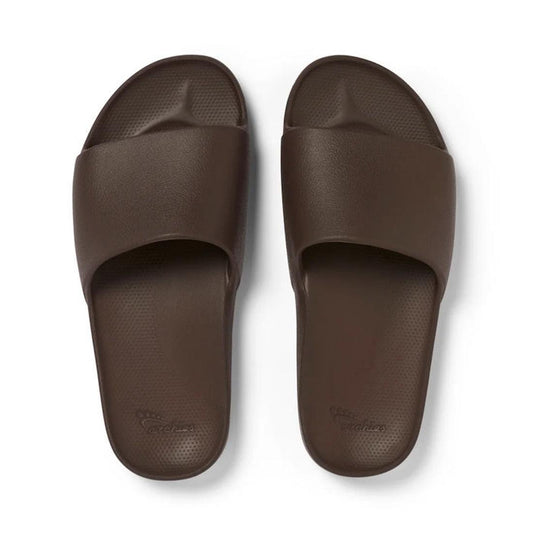 Archies Arch Support Slide in Chocolate Brown—easy slip-on sandal with a wide strap, cozy textured sole, and gentle arch support.  ksnz