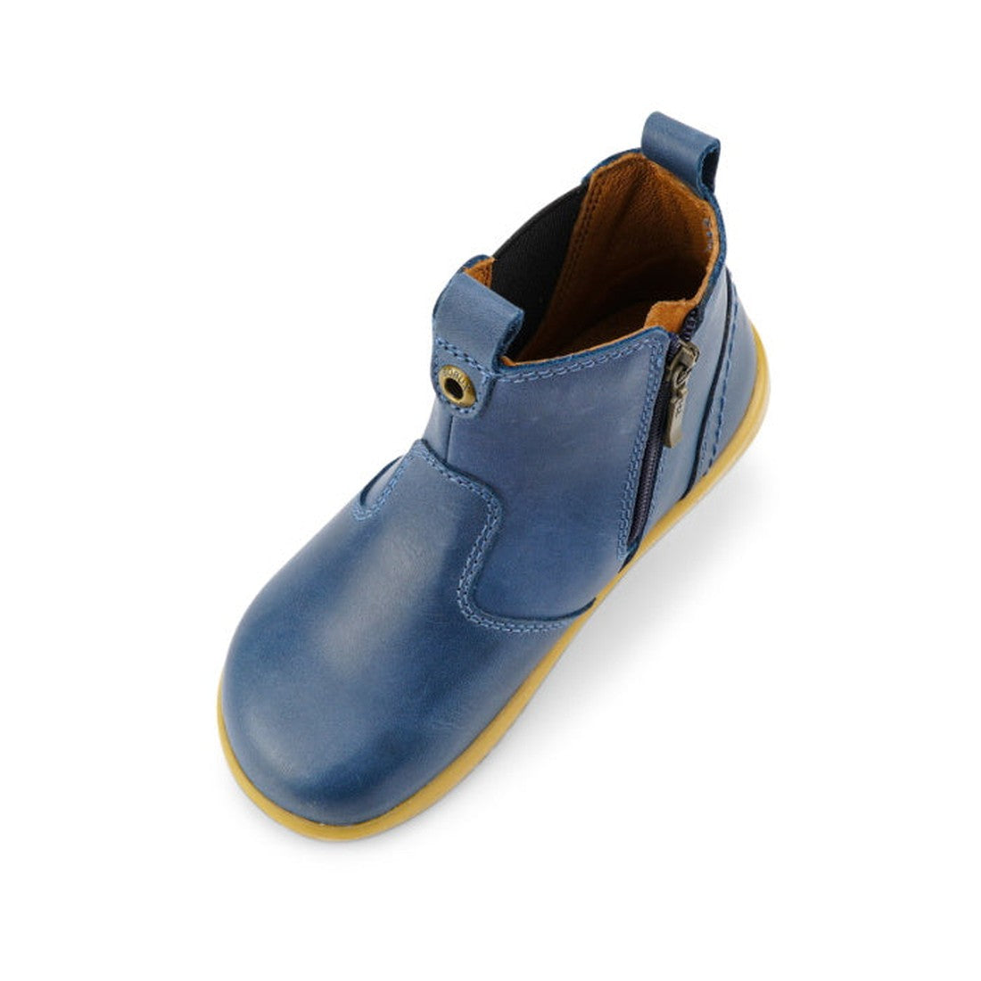 A single Bobux Iwalk Jodhpur Ankle Boot in midnight blue, with a side zipper, brown lining, and light tan rubber sole, is displayed on a white background., 9420068521155, 9420068521162, 9420068521179, 9420068521186, 9420068521193