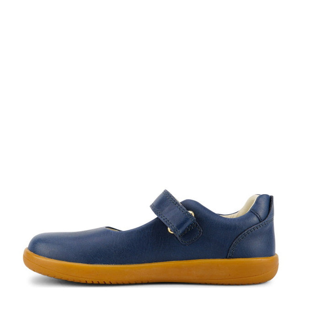 The Bobux Kid+ Delight Mary Jane Navy 831615Z is a single classic navy leather shoe for girls, featuring a hook-and-loop strap and light brown rubber sole. Displayed in side profile on white, it’s ideal for stylish girls’ shoe collections., 9420075721210,
