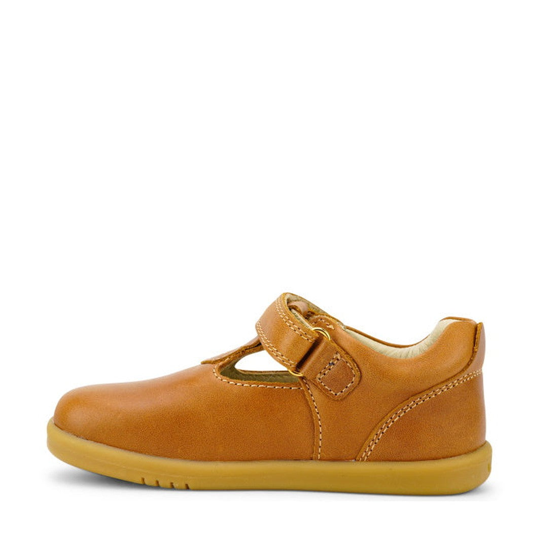 The Bobux Iwalk IW Louise T-Bar Caramel Tan is a children’s tan leather shoe with a rubber sole and adjustable strap, shown in side profile against a white background., 9420062092170, 9420062092187, 9420062092194, 9420062092200, 9420062092217