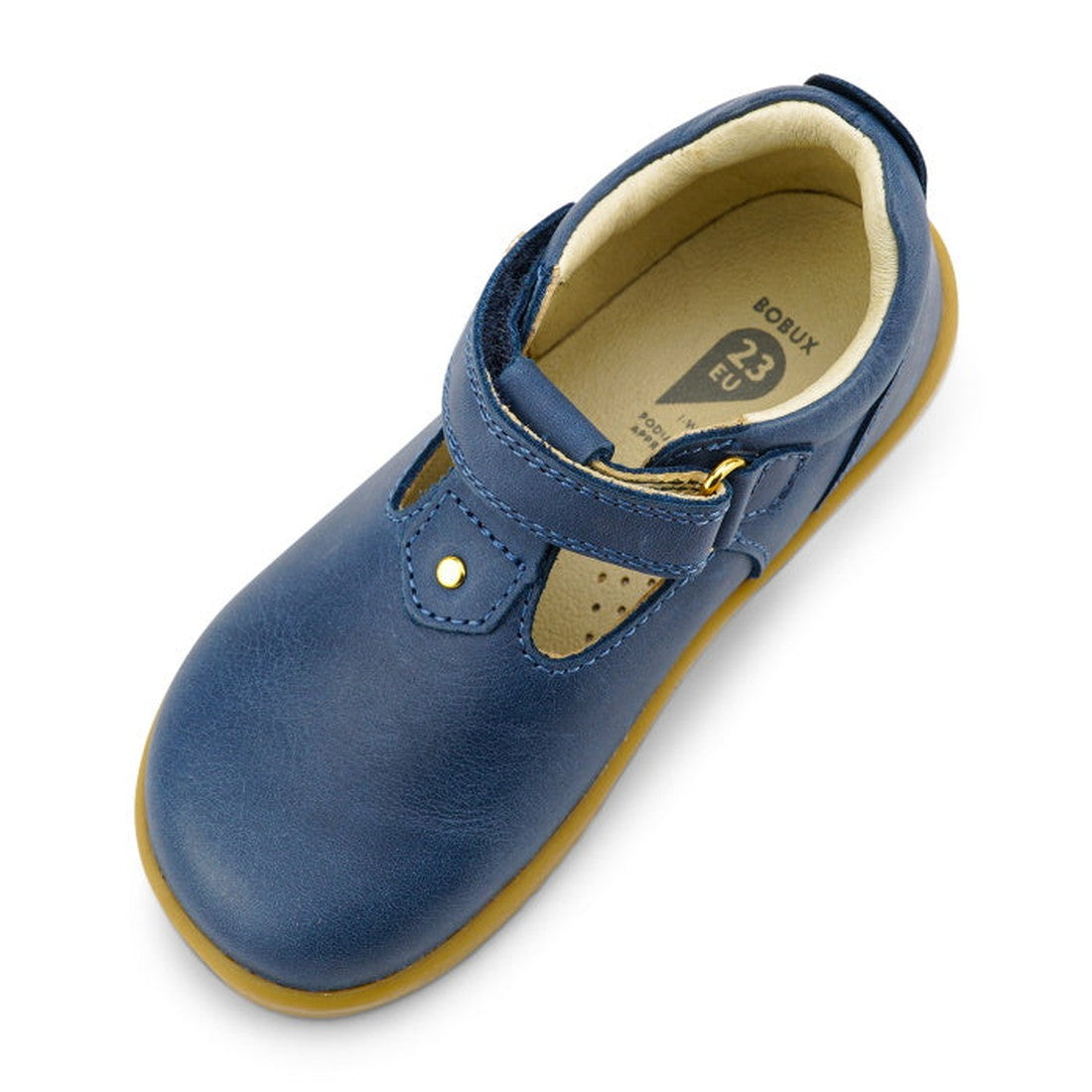 The Bobux IW Iwalk Louise Midnight Blue 633030 is a children’s T Bar shoe with a blue leather upper, tan rubber sole, snap button, and beige inner lining, shown from above at a slight angle., 9420068521841, 9420068521858, 9420068521865, 9420068521872, 942