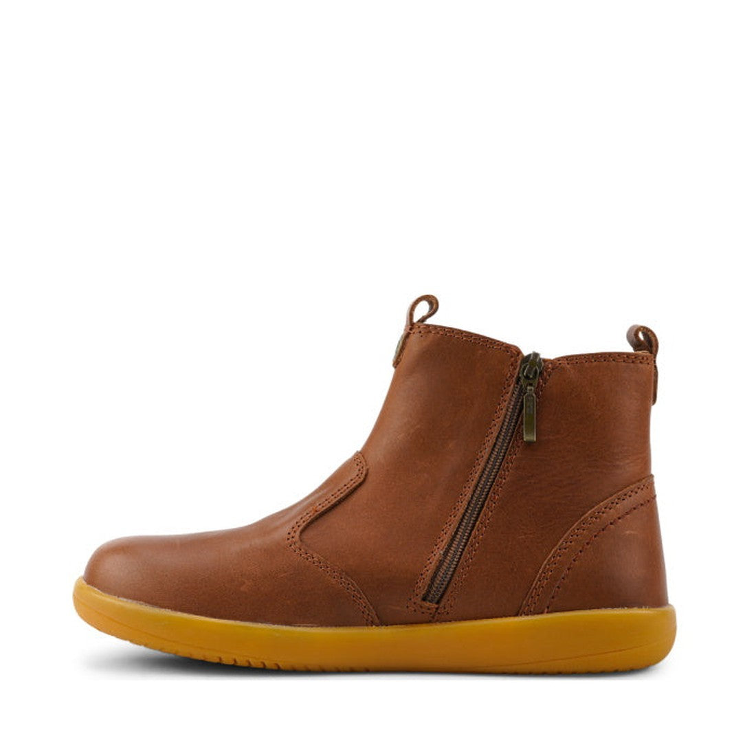 The Bobux Kid+ Jodhpur Leather Boot Toffee 830010E is a unisex kids' brown leather boot with a yellow rubber sole, side zipper, and pull tabs, shown in a left side profile on a white background., 9420068521414, 9420068521421, 9420068521438, 9420075719989,