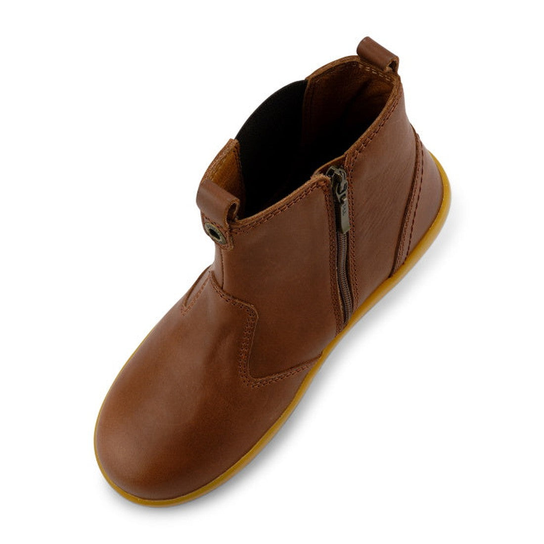The Bobux Kid+ Jodhpur Leather Boot Toffee 830010E features brown leather, a yellow rubber sole, side zipper, and front/back pull tabs. Photographed on a white background, these unisex kids boots offer style and comfort., 9420068521414, 9420068521421, 942