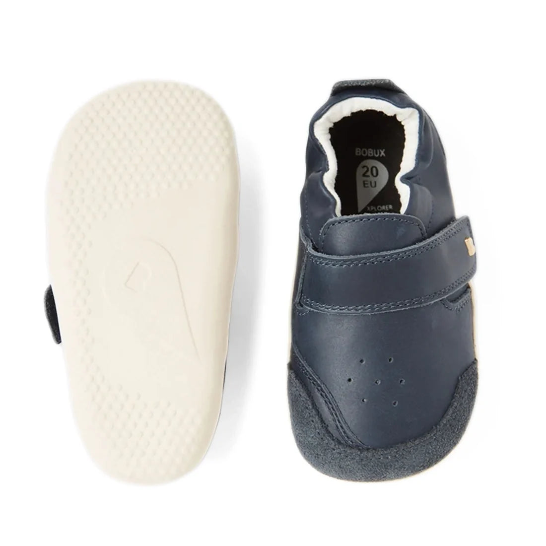 A pair of Bobux XP Explorer Ripple First Walker shoes in navy, one highlighting the velcro strap on top and the other revealing the white, flexible sole. Designed as a first walker shoe for toddlers, size 20 EU is marked inside., 42842, 9420068568563, 942