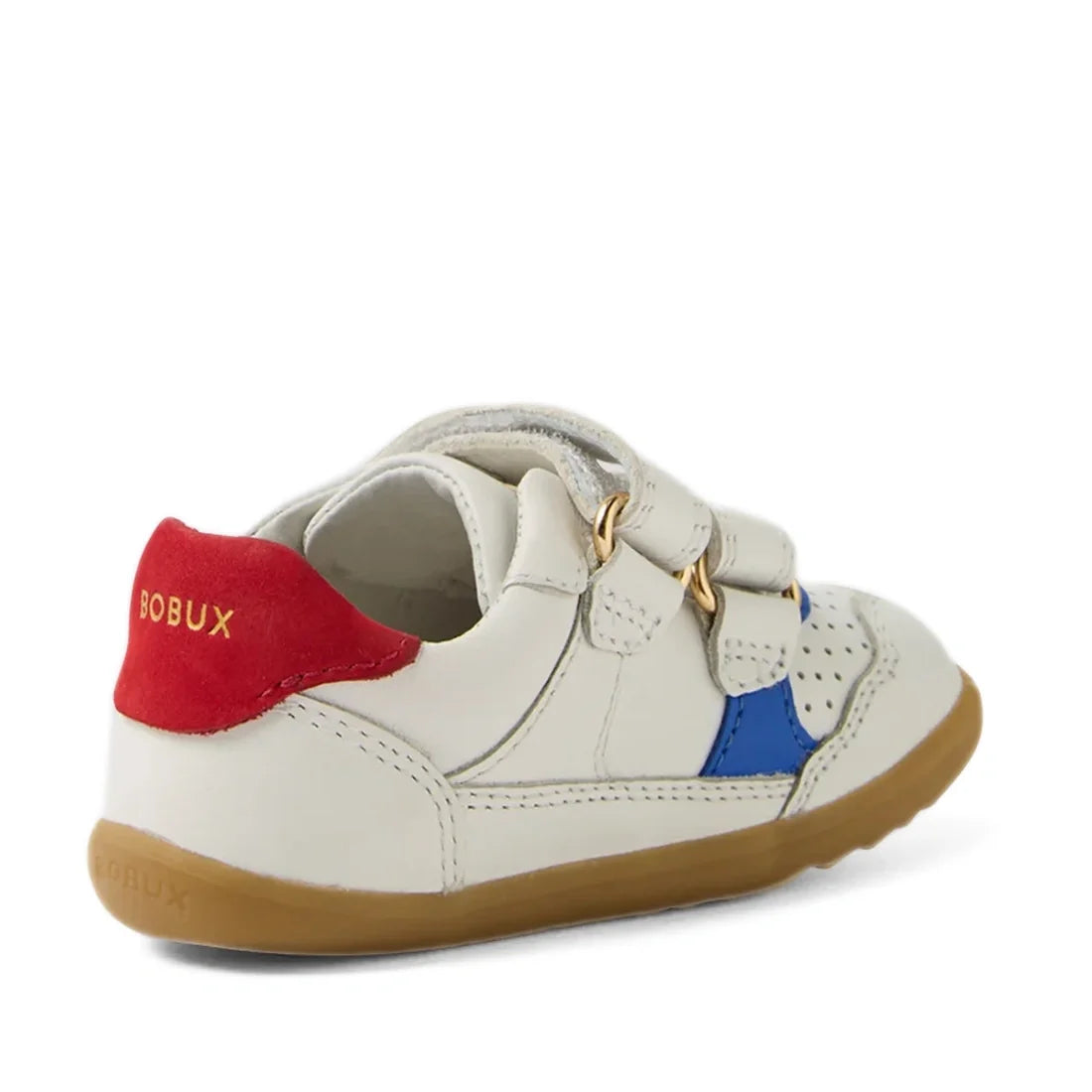 A small white leather sneaker with easy velcro straps, featuring blue and red (salsa) accents and a tan rubber sole—ideal as first walker shoes. The gold-printed BOBUX branding on the red heel tab adds a stylish touch, making the Bobux SU Step Up Hunter L