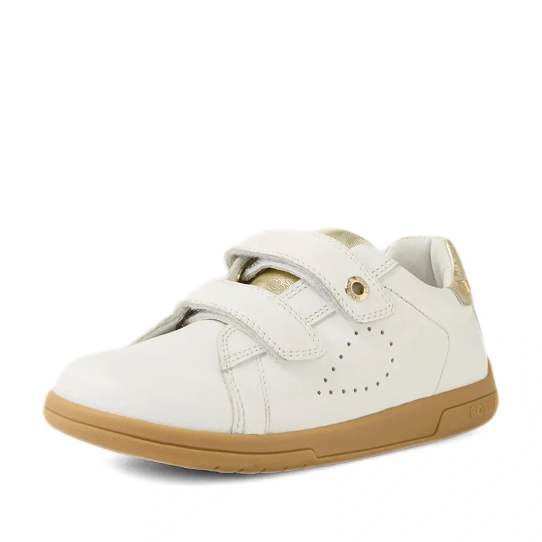 The Bobux Kid+ Plus KP Maverick Leather Sneaker White Gold showcases a pristine white leather finish with stylish gold detailing, two adjustable velcro straps for a secure fit, subtle side perforations for breathability, and a light brown rubber sole. The