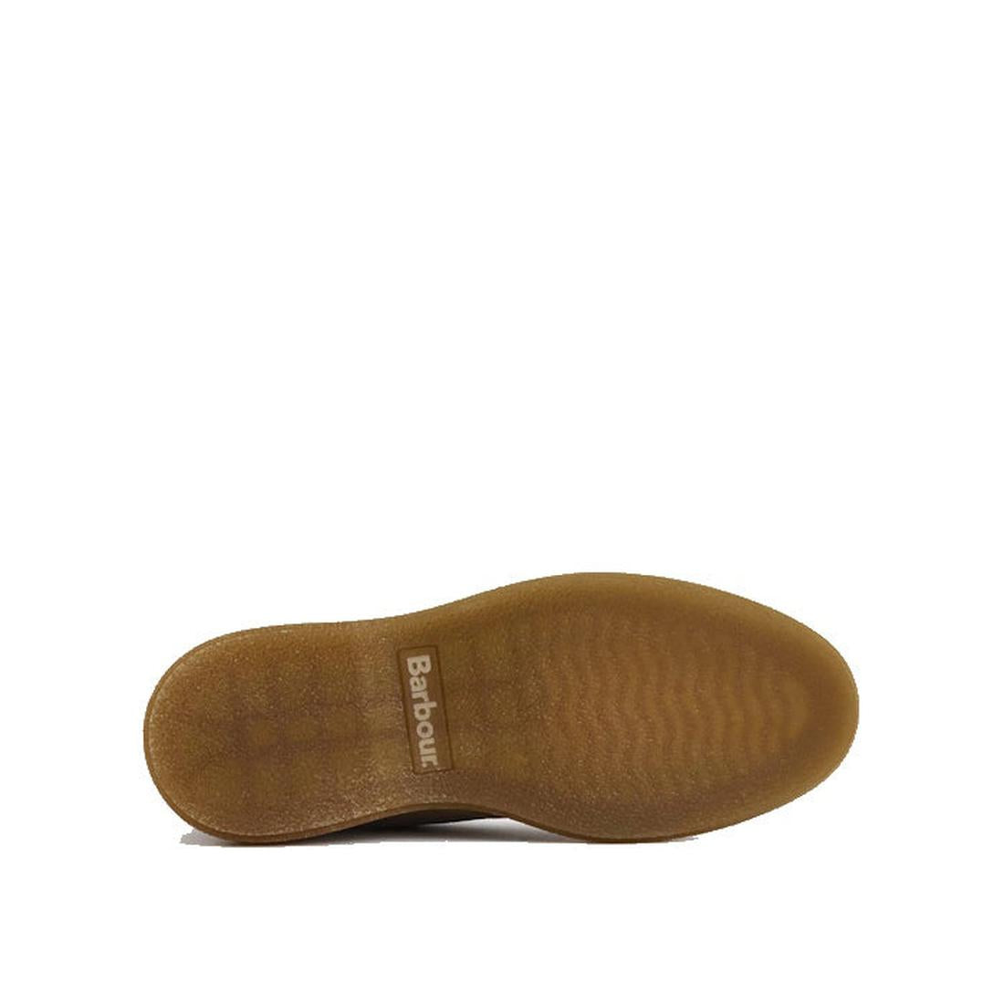 The image displays the sole of the Barbour Mens Blaine Chukka Lace Up Taupe Suede Boot, made of textured light brown rubber with "Barbour" printed near the arch, reflecting its signature refined style and comfort., 5063669166789, 5063669166796, 5063669166