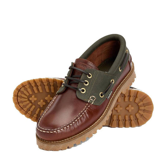 The Barbour Mens Re-Engineered Deck Boat Shoes in Mahogany feature brown leather uppers, olive side panels, tan rubber lug soles, dark brown laces, and stylish stitching. One shoe stands upright while the other is on its side. Perfect for casual looks., 
