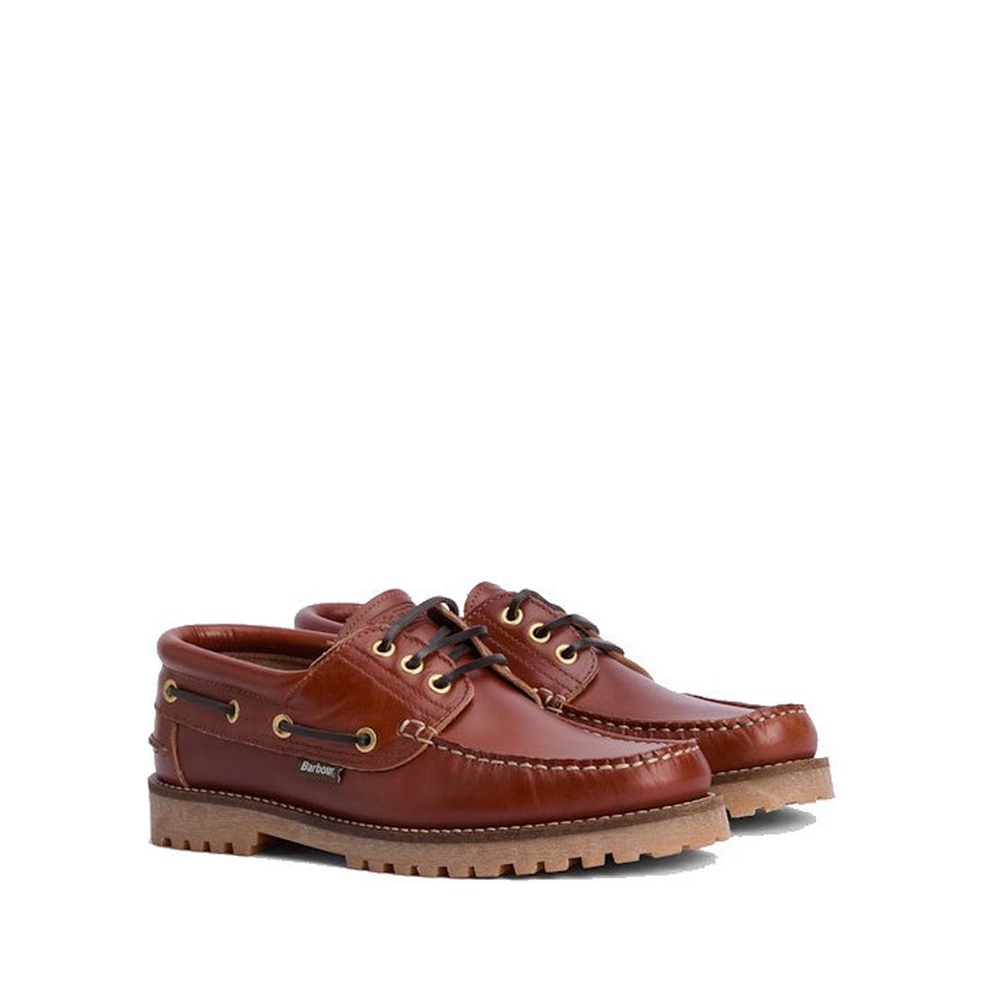Barbour Mens Re-Engineered Deck Boat Shoes Tan: brown leather deck shoes with tan rubber sneaker-inspired soles, gold eyelets, black laces, and white stitching, shown against a white background.