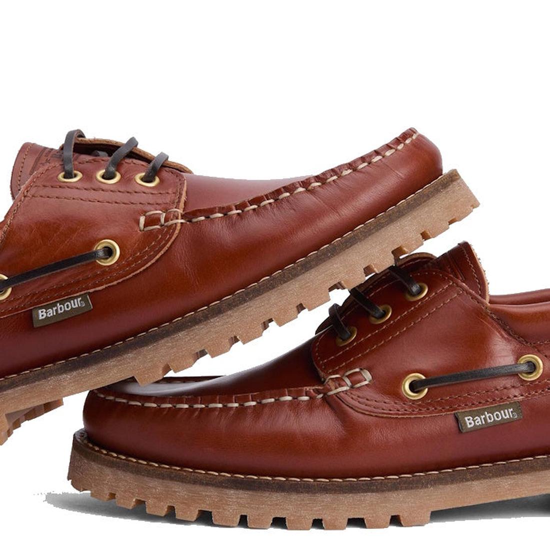 The Barbour Mens Re-Engineered Deck Boat Shoes Tan feature a brown leather upper, sneaker-inspired sole, gold eyelets, black laces, and Barbour branding on the side., 5020985782178, 5020985782659, 5020985783274, 5020985779802, 51888