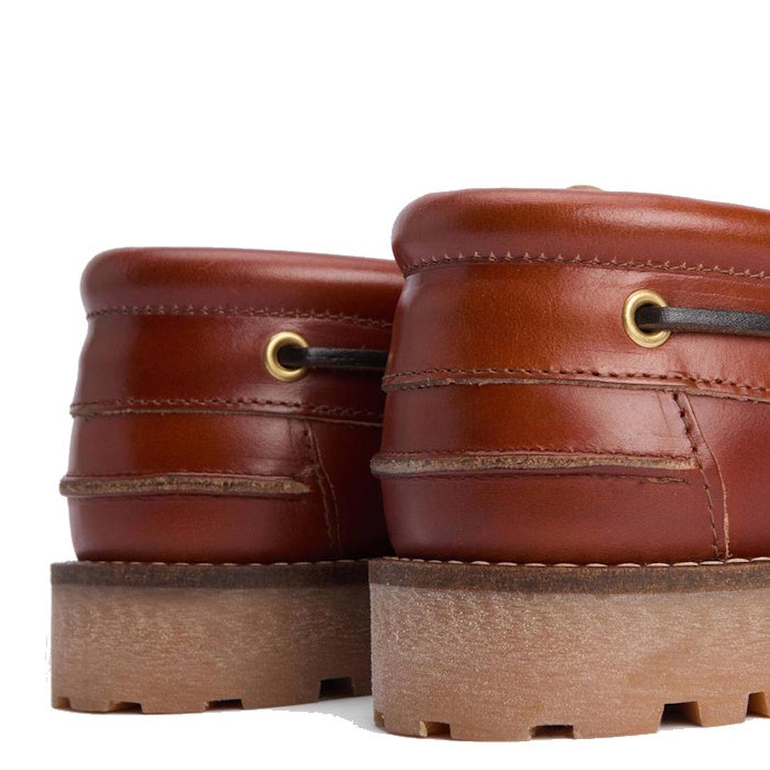 Close-up of the Barbour Mens Re-Engineered Deck Boat Shoes in tan, showing the back and side with thick sneaker-style soles, brass eyelets, and brown leather upper on a white background., 5020985782178, 5020985782659, 5020985783274, 5020985779802, 51888