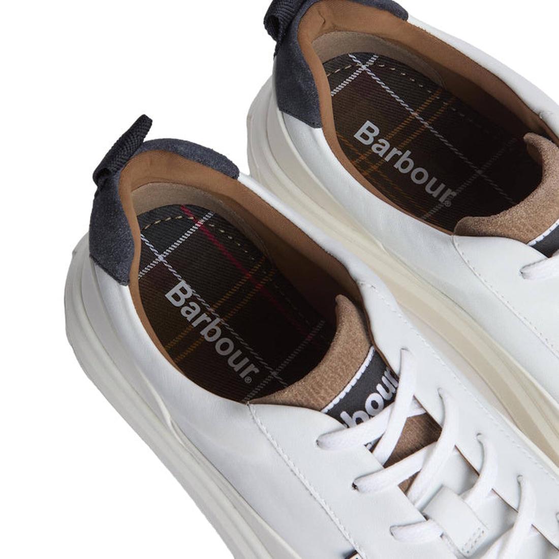 Barbour Mens Stannington White Navy Trench Leather Trainers feature white leather, plaid insoles, beige tongues, and dark blue heel tabs, displayed from above on a white background., 5063669168325, 5063669168332, 5063669168271, 51896