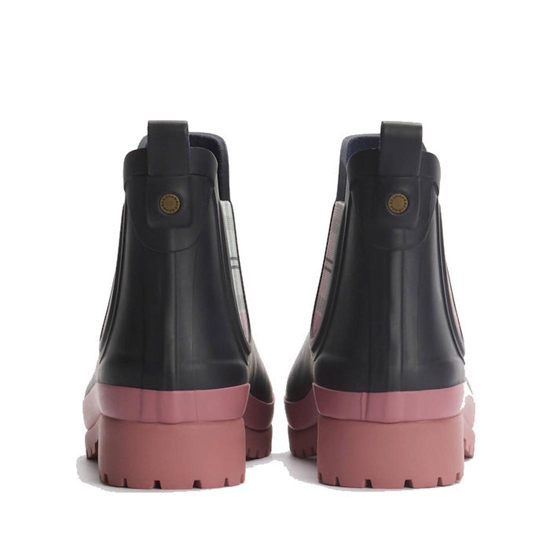 The Barbour Mallow Navy Cherry Blossom Chelsea Womens Wellington Rainboots feature black ankle-high uppers, pink chunky soles, and heel pull tabs—combining style and weatherproof function for any adventure., 5063669170908, 5063669170915, 5063669170922, 50