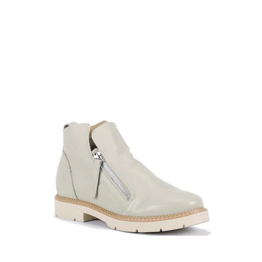 The Bay Lane Clara Ice Light Grey Womens Leather Low Cut Ankle Zip Boot features premium leather, a luxe support footbed, side zipper, tan midsole, and chunky cream outsole, shown on a white background.