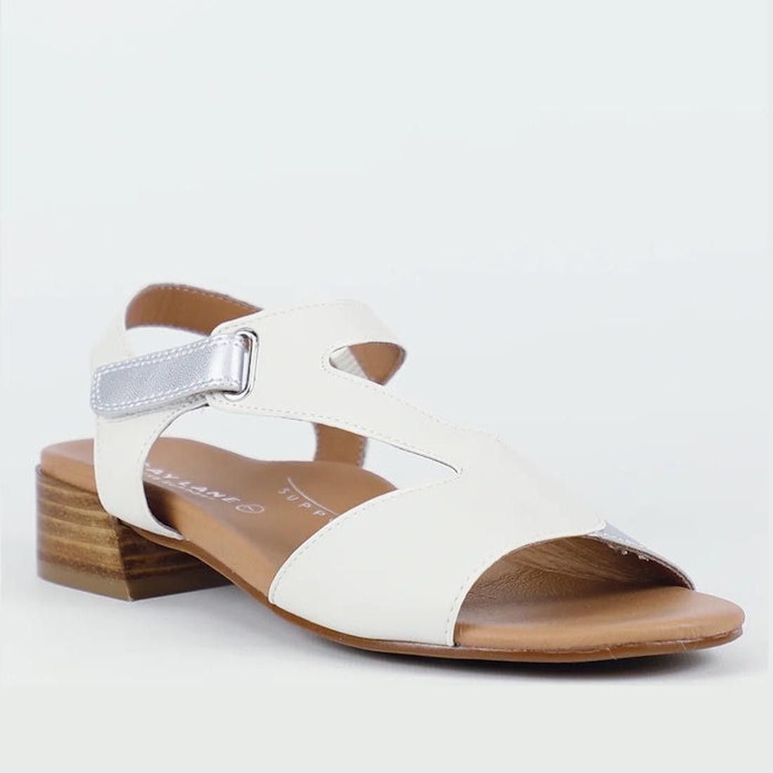 The Bay Lane Dune Women's Leather Low Heel Sandal in Ice White features a low wooden block heel, Luxe Support footbed, silver buckle ankle strap, and side cutouts, shown against a plain light background.