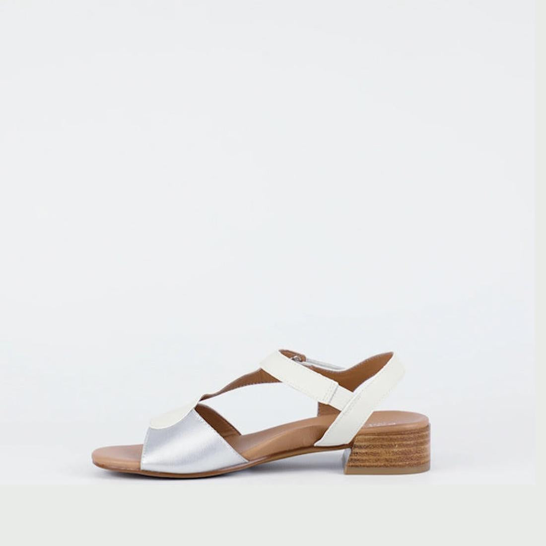 The Bay Lane Dune Womens Leather Low Heel Sandal Ice White features ice and white straps, an open toe, a low stacked heel, and a Luxe Support footbed for comfort, all shown against a plain white background., 9357649063622, 9357649063639, 9357649063646, 93