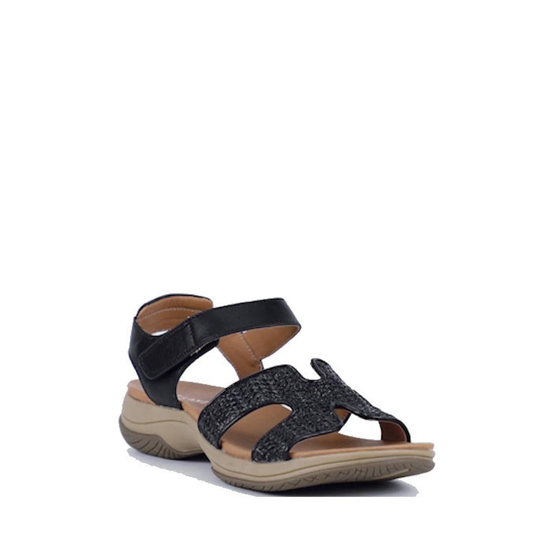 The Bay Lane Torquay Black Raffia Women's Leather Sandal features a low tan sole, cushioned footbed, adjustable ankle strap, and a textured raffia-inspired front strap—perfect for comfort and casual summer wear.