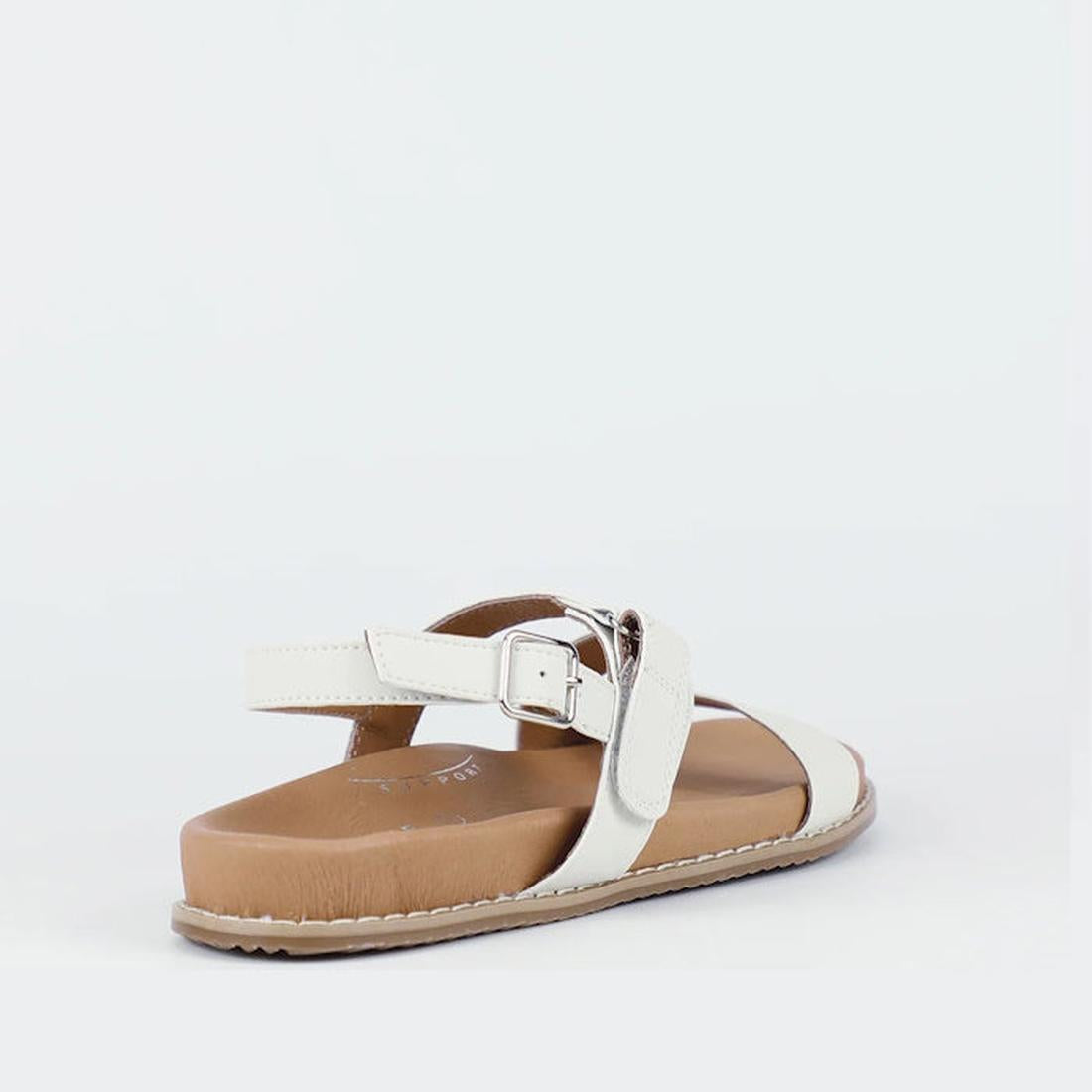 The Bay Lane Zorba Ice White Women's Leather Flat Sandal features a brown sole, adjustable ankle strap with silver buckle, cushioned footbed, and back strap. Shown on a plain white background., 9357649064407, 9357649064414, 9357649064421, 9357649064438, 9