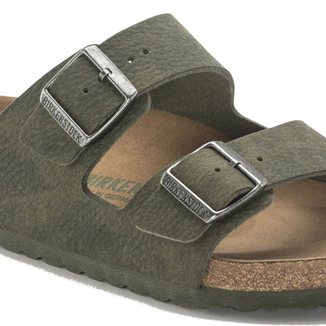 Showing the detail of the birkenstock vegan slide Green sandal with silver buckles on a white background., 4061418353306,
4061418353344,
4061418353382,
4061418353429,, 49322, 49323, 49324, 49325, 4061418353306, 4061418353344, 4061418353382, 4061418353429