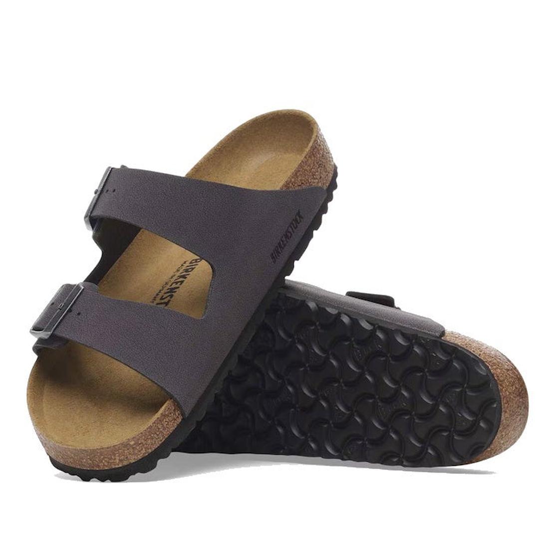 A pair of Birkenstock Arizona Velvet Grey Birkibuc sandals (Regular Fit) with a cork-latex footbed and two adjustable straps, one shown upright to highlight the textured black rubber sole.