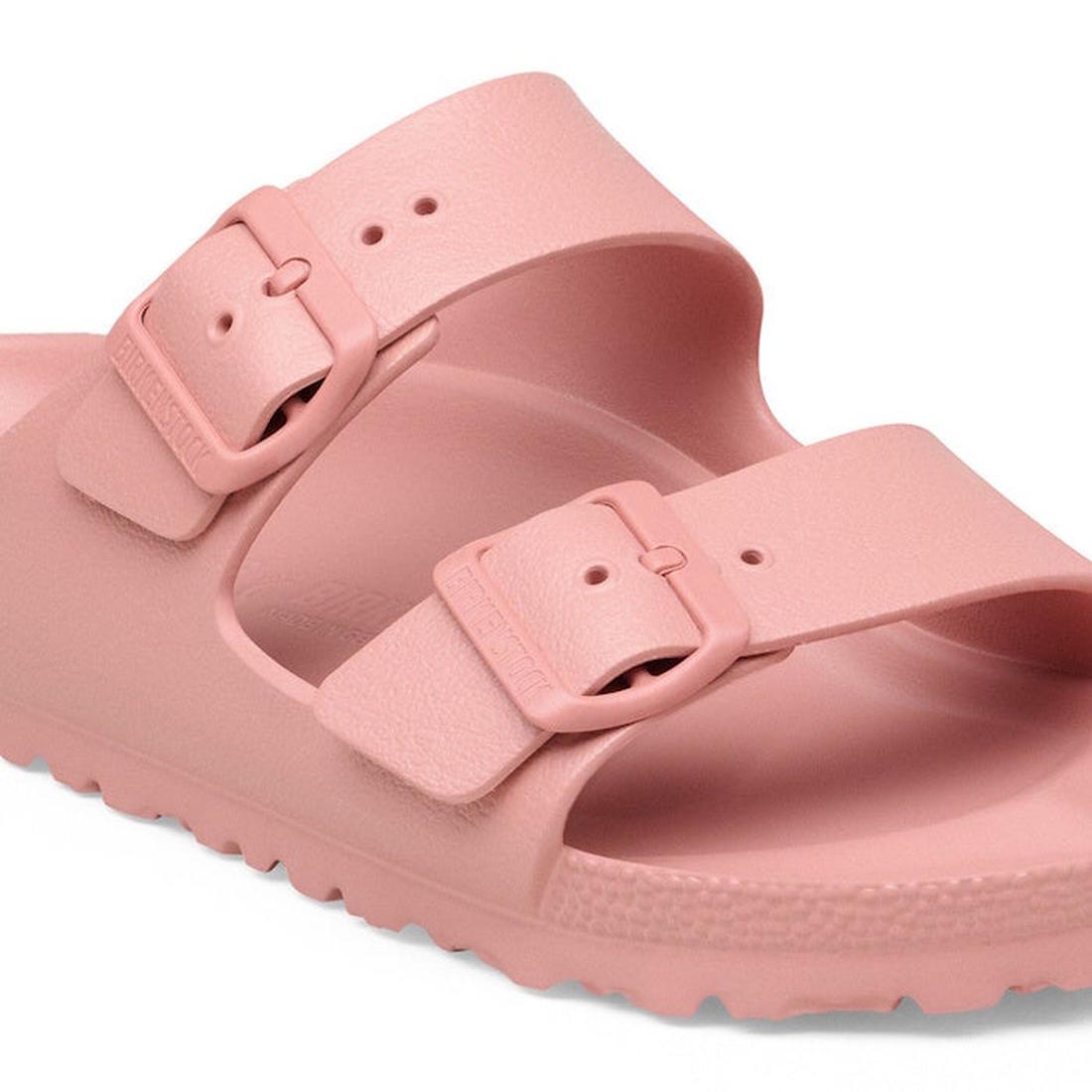 A close-up of the BIRKENSTOCK Arizona EVA Pink Clay sandal in narrow width, featuring two adjustable buckle straps, a textured sole, and an anatomically shaped footbed for casual comfort., 52535, 4067707638901, 4067707638949, 4067707638987, 4067707639021,